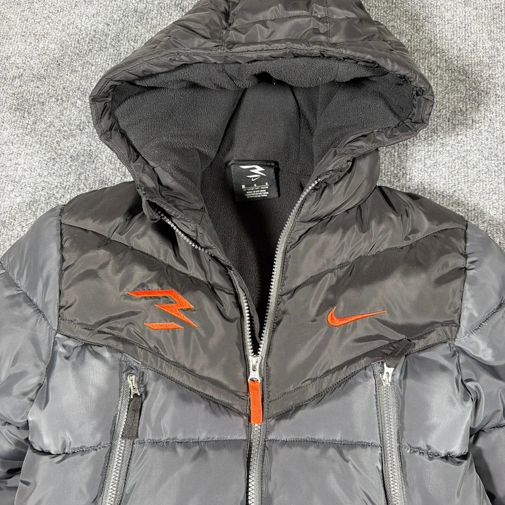 Nike 3Brand Puffer Jacket Kids Large‎ Black Orange Russell Wilson Hooded